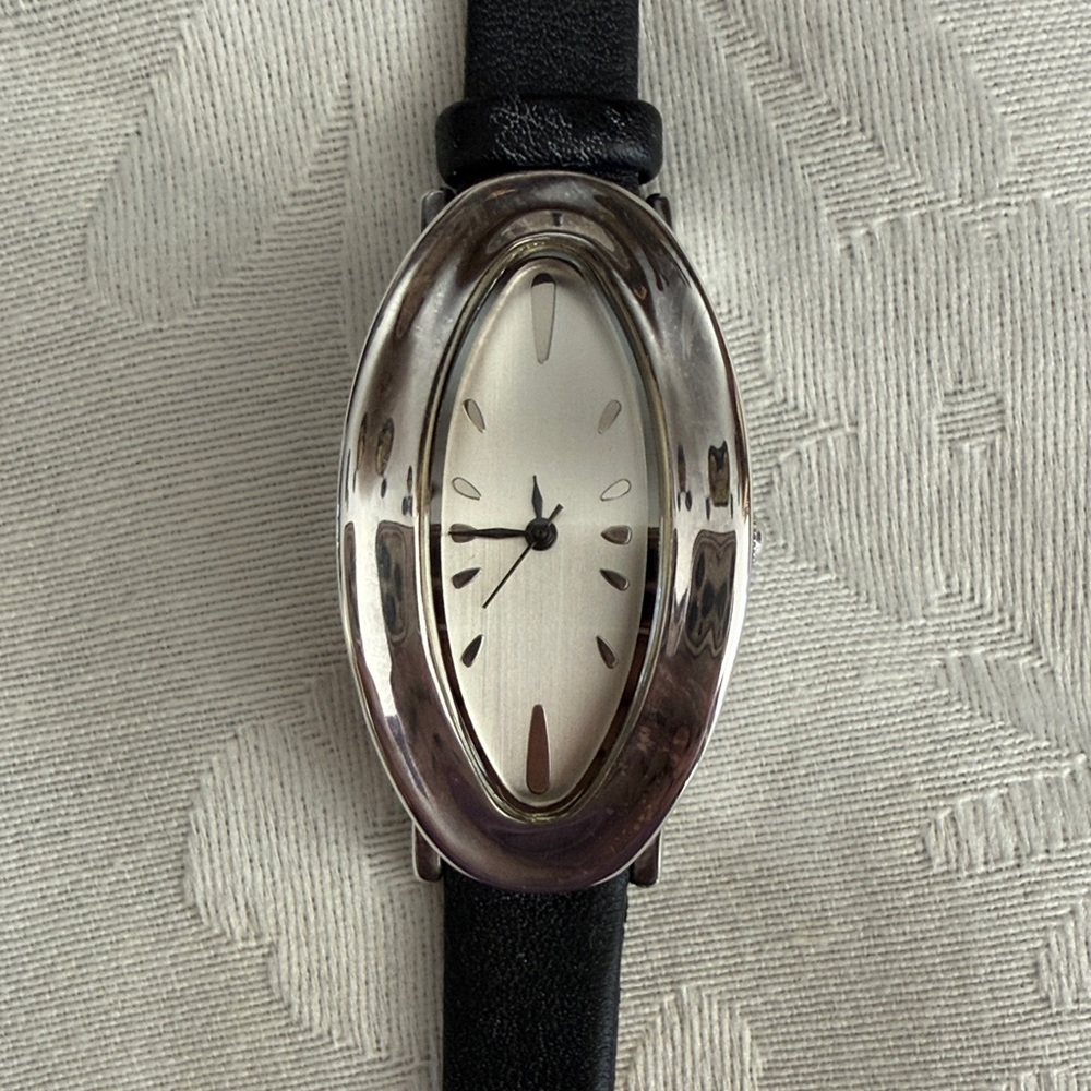 Elegant Oval Silver-Tone Watch with Black Leather Strap